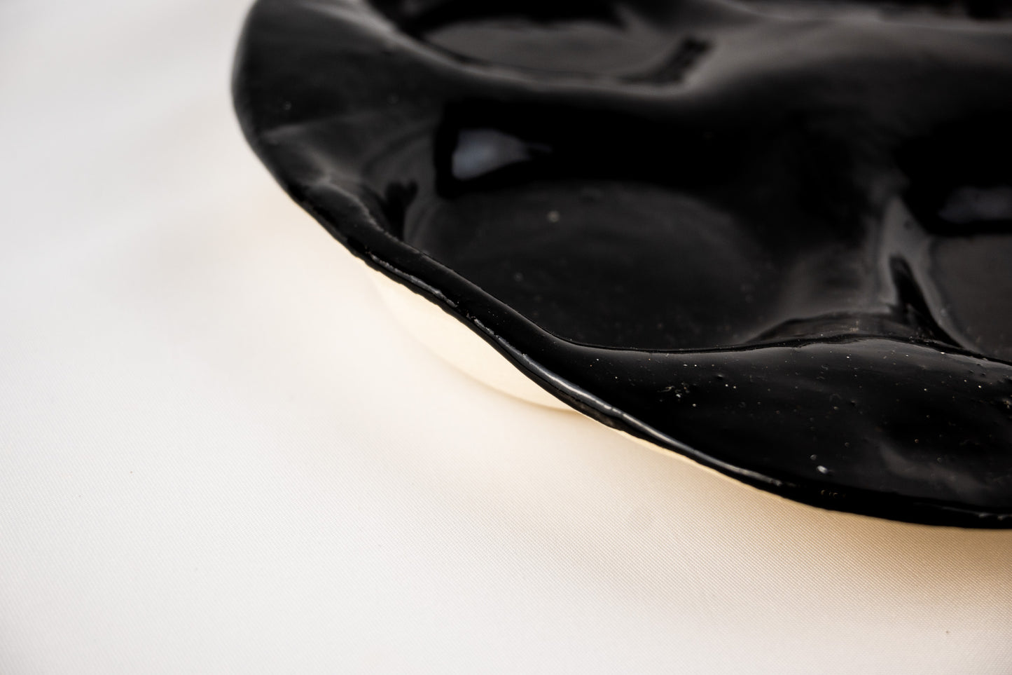 Entertaining platter in glossy black glaze