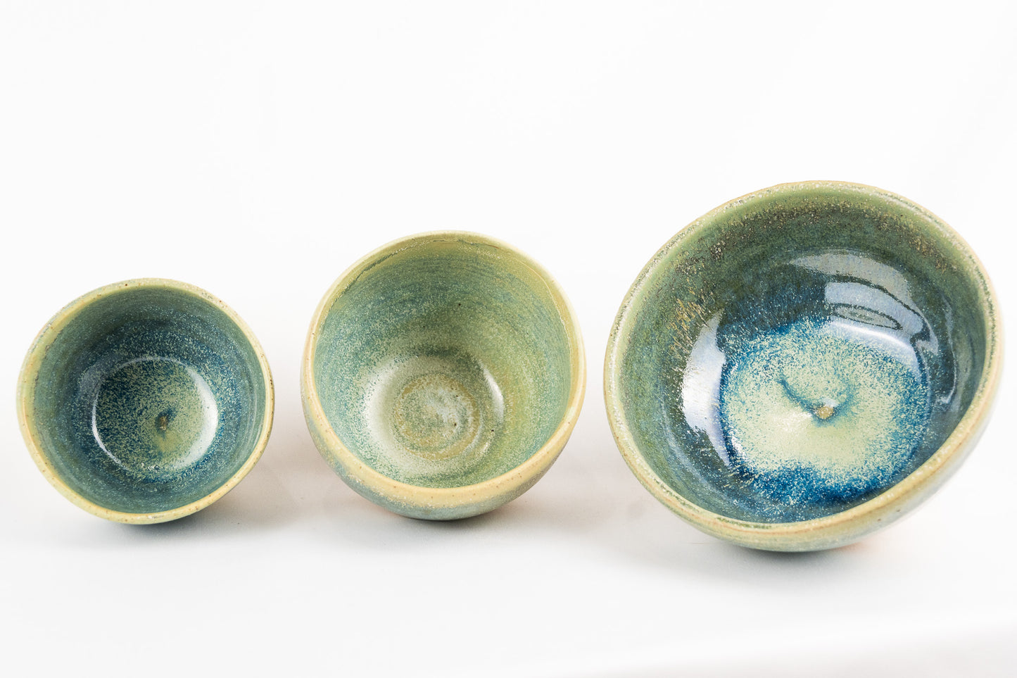 Pistachio glazed bowl with hand cut features