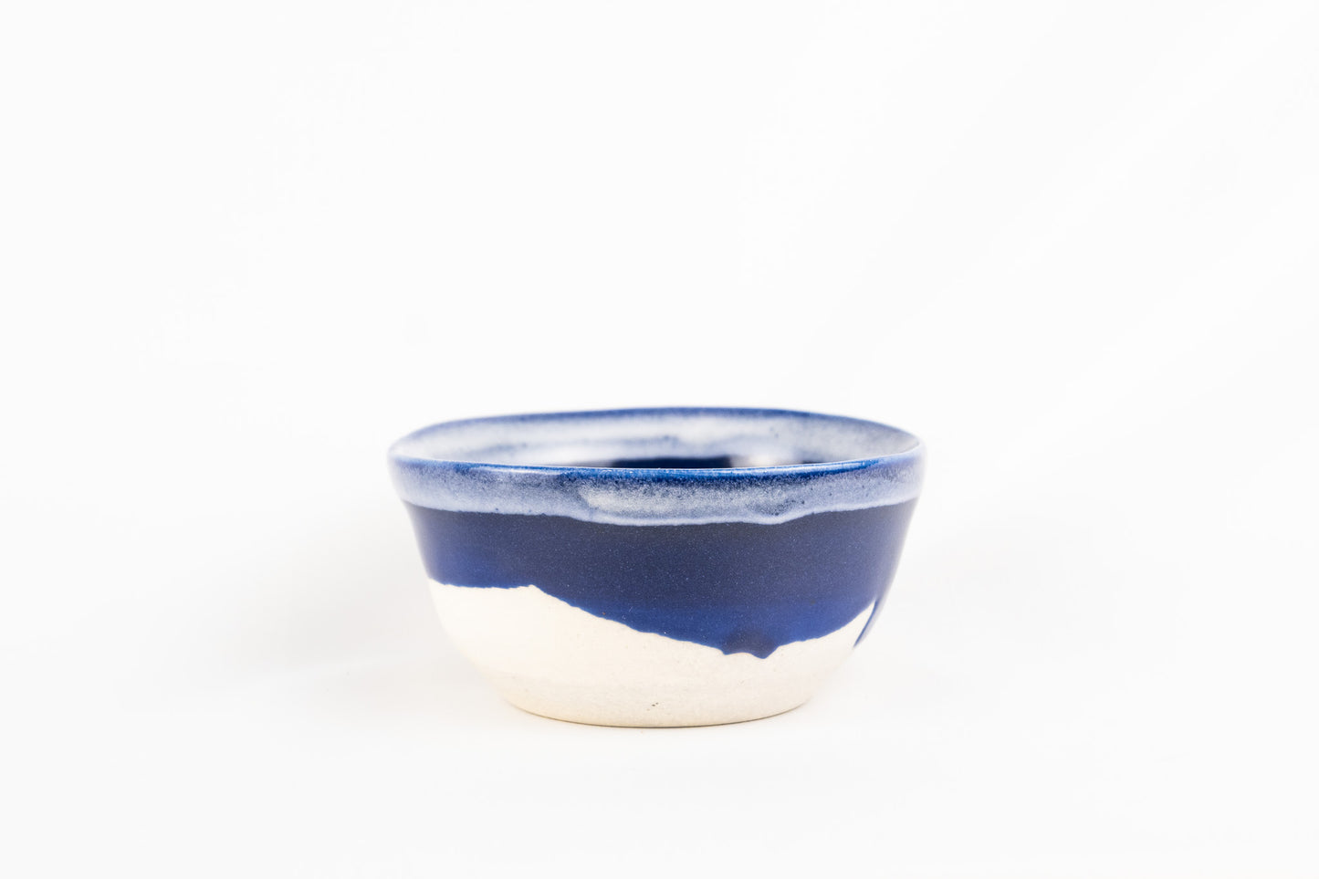 Dark Blue glaze with a splash of white dipped on top bowl/container