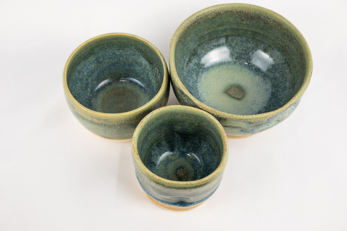 Pistachio glazed bowl with hand cut features