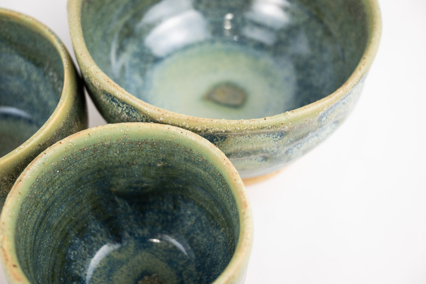 Pistachio glazed bowl with hand cut features