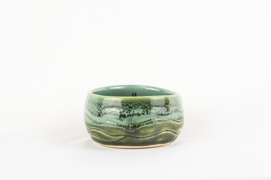 Green white wash glazed bowl with wave detail