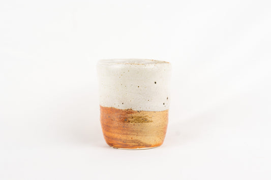 Tall mug half half brown and white glaze