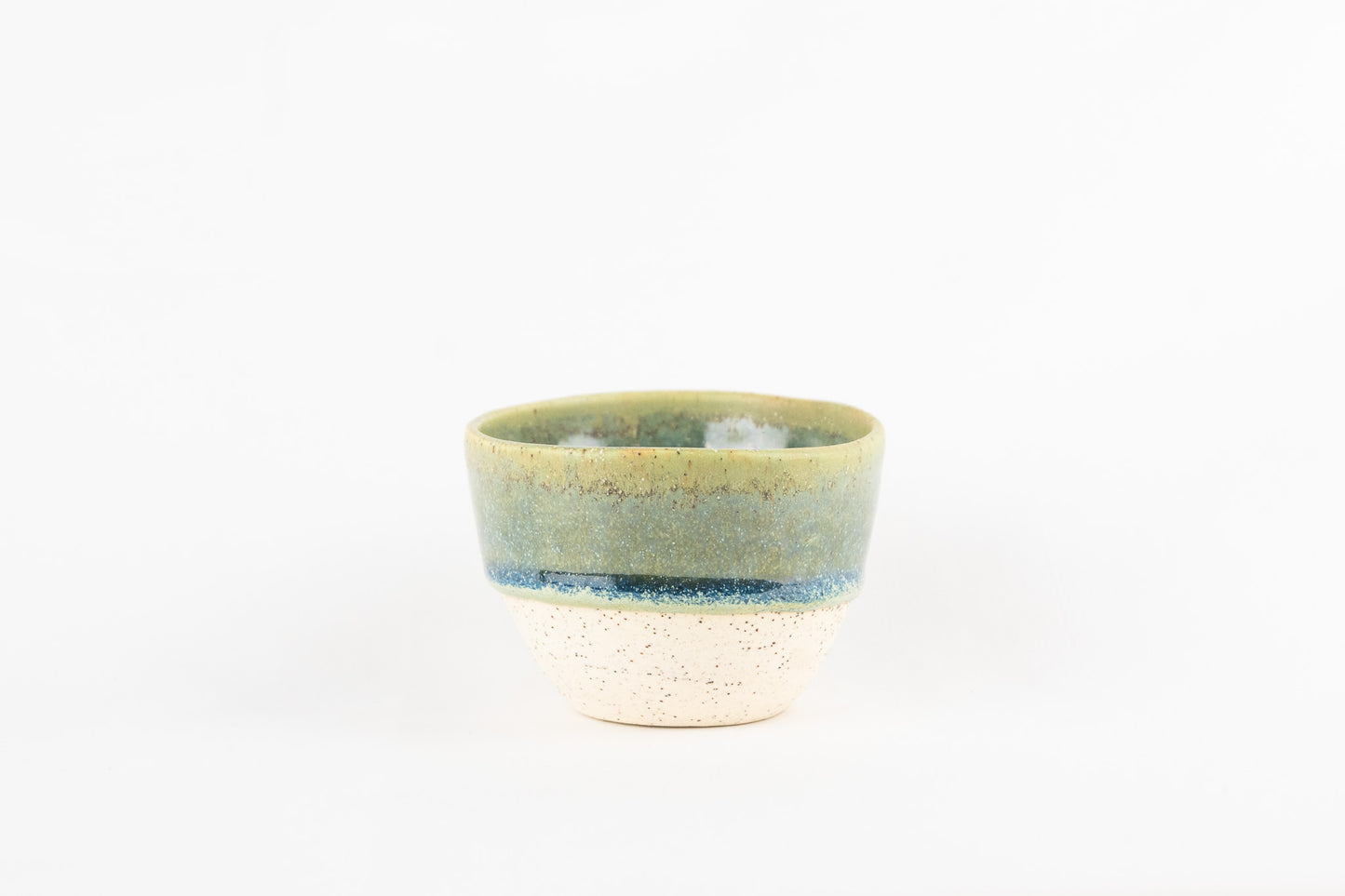 Pistachio layered small mug with exposed white speckled clay body